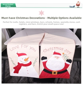 Detail of embroidered Santa and snowman patterns on 180cm festive table runner cloth