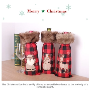 Detailed view of red and black plaid wine bottle covers with Santa, Snowman and Deer embroidery