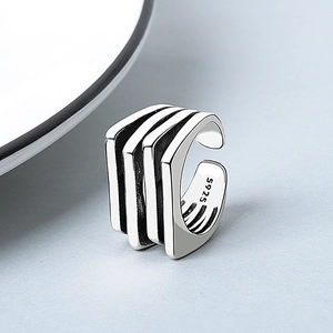 Vintage irregular multi-layer silver wide ring with S925 engraving on textured background