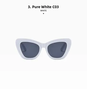 Close-up of solid white cat-eye sunglasses featuring dark lenses and sleek frames