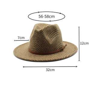 Detail view of brown houndstooth wool fedora with 7cm brim and leather band dimensions