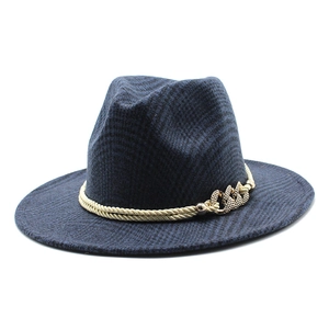 Detail of navy plaid wool fedora hat featuring golden twisted rope and metallic chain
