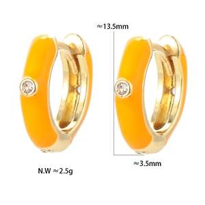 Detail view of orange enamel U-shape hoop earring with gold finish and zircon stone