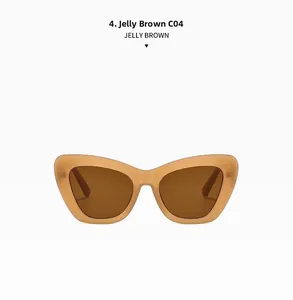 Detailed view of women's cat eye sunglasses in jelly brown frame with dark tea lenses