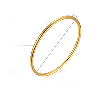 Technical view showing 60mm diameter and 3mm width of polished gold stainless steel bangle