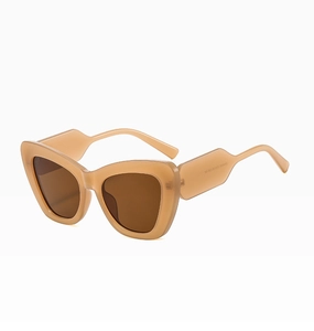 Detail view of wide irregular temples on oversized cat-eye sunglasses with CE marking