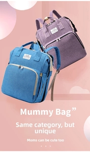 Detail of purple and blue multifunctional mummy bags with large front zipper pockets