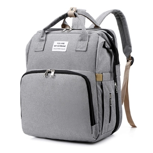 Multifunctional grey diaper backpack with foldable bed and You Are My Sunshine print