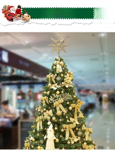 Detailed Christmas tree with golden ornaments, silk bows and Merry Christmas signage