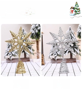 Detailed comparison of gold and silver glitter snowflake tree toppers with spiral bases