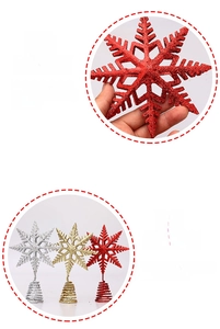 Detailed view of glittering snowflake Christmas tree toppers in red, gold, and silver finishes