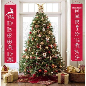 Red Christmas door banners with Merry Christmas and Welcome text beside a festive tree