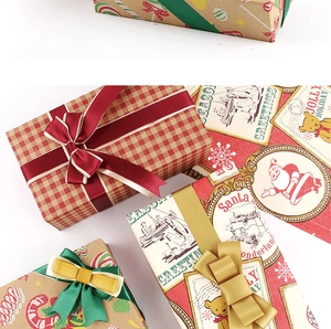 Close-up of vintage kraft gift wrap with red plaid patterns and silk ribbon bow detail