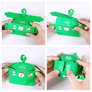 Step-by-step assembly guide for green Christmas paper candy gift box with ribbon