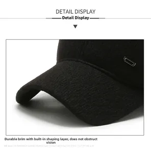 Detail of wool baseball cap brim with durable interlayer and D-shaped metal accent