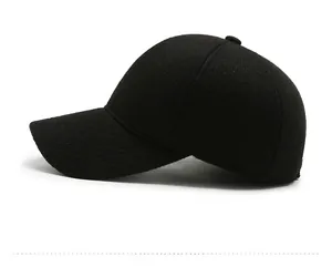 Detail view of black textured wool baseball cap with silver metal buckle on side