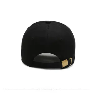 Rear view of black cotton baseball cap showing adjustable brass buckle and strap