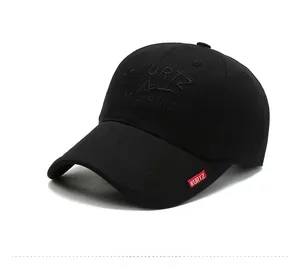 Side view of black cotton twill baseball cap with A-KURTZ embroidery and red woven label