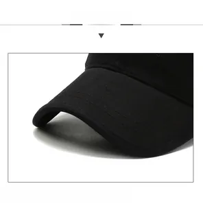 Close-up detail of black baseball cap brim with KURTZ woven label and fabric texture