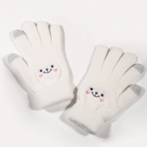 Detail of cream knit gloves featuring cute cartoon embroidery and touchscreen tips
