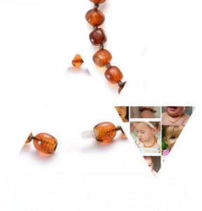 Makro-Detail von Bernstein Baby-Halskette mit sicherem Schraubverschluss und doppelten Knoten