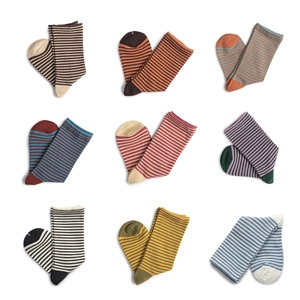 Set of nine pairs of French style striped cotton crew socks in diverse color combinations