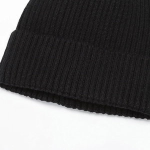 Classic black ribbed knit beanie hat for men featuring a warm folded brim design
