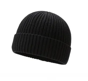 Detail of high-elastic black ribbed knit beanie with thick fold-over cuff design