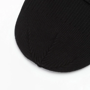 Black ribbed knit beanie with premium stitching and warm texture for winter wear