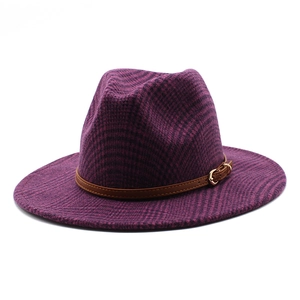 Detail of purple houndstooth wool fedora hat with brown leather band and gold buckle