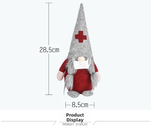 Vue détaillée du gnome infirmier de Noël avec dimensions de 28,5 cm sur 8,5 cm