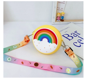 Detail of yellow silicone rainbow cloud kids crossbody bag with printed shoulder strap