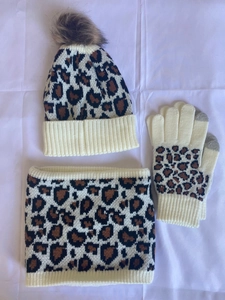 Winter leopard print knit set including a pom-pom beanie hat, scarf, and touch-screen gloves