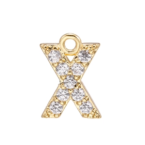 Detailed view of a gold-plated letter X pendant with micro-pave cubic zirconia stones