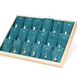 Wooden jewelry display tray with blue velvet lining and 21 necklace slots for storage