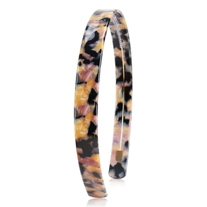 Macro detail of the tortoiseshell pattern on a 1.5cm wide acetate resin headband