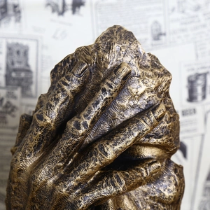Abstract creative thinker sculpture with metallic texture and vintage art stone finish