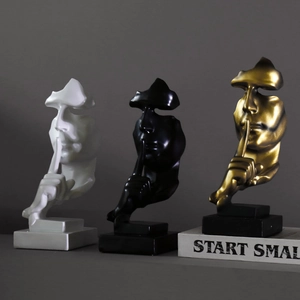 Sculptures de visage abstraites le silence est d'or en or noir et blanc pour bureau