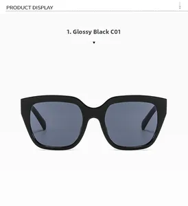 Detail view of oversized square sunglasses in bright black C01 with dark grey lenses