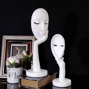 Modern white resin abstract face sculptures for living room decor on retro books