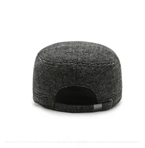 Detail of adjustable metal buckle and textured fabric on back of the men's flat top cap