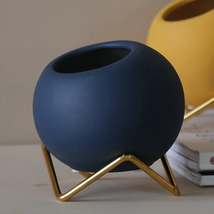 Nordic dark blue ceramic planter with gold geometric stand for minimalist home decor