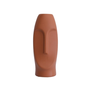 Minimalist Morandi terracotta ceramic face vase with abstract geometric design