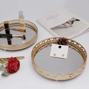 Nordic luxury gold metal jewelry tray with mirrored base and heart-shaped hollow patterns