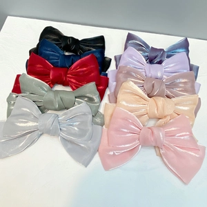 Large organza bow hair clips in multiple colors with elegant pearlescent satin finish