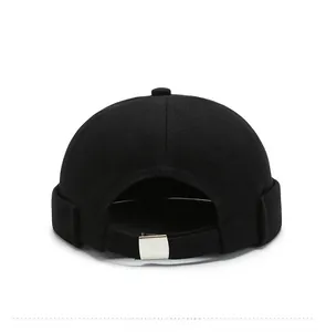 Rear view of black cotton Miki hat showing adjustable silver metal buckle and closure
