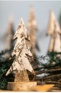 Macro view of natural birch bark texture on a wooden Christmas tree table ornament