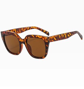 Detail of trendy leopard print sunglasses with oversized frames and brown resin lenses
