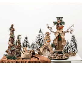 Detailed arrangement of wooden snowman ornaments with pine trees and rustic bark textures
