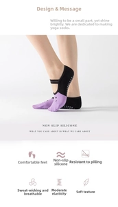 Detail of yoga socks featuring non-slip silicone dots and elastic cross straps
